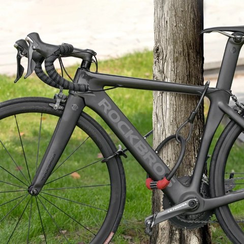 Zapięcie rowerowe na szyfr ze stalową linką 55 cm - czerwone